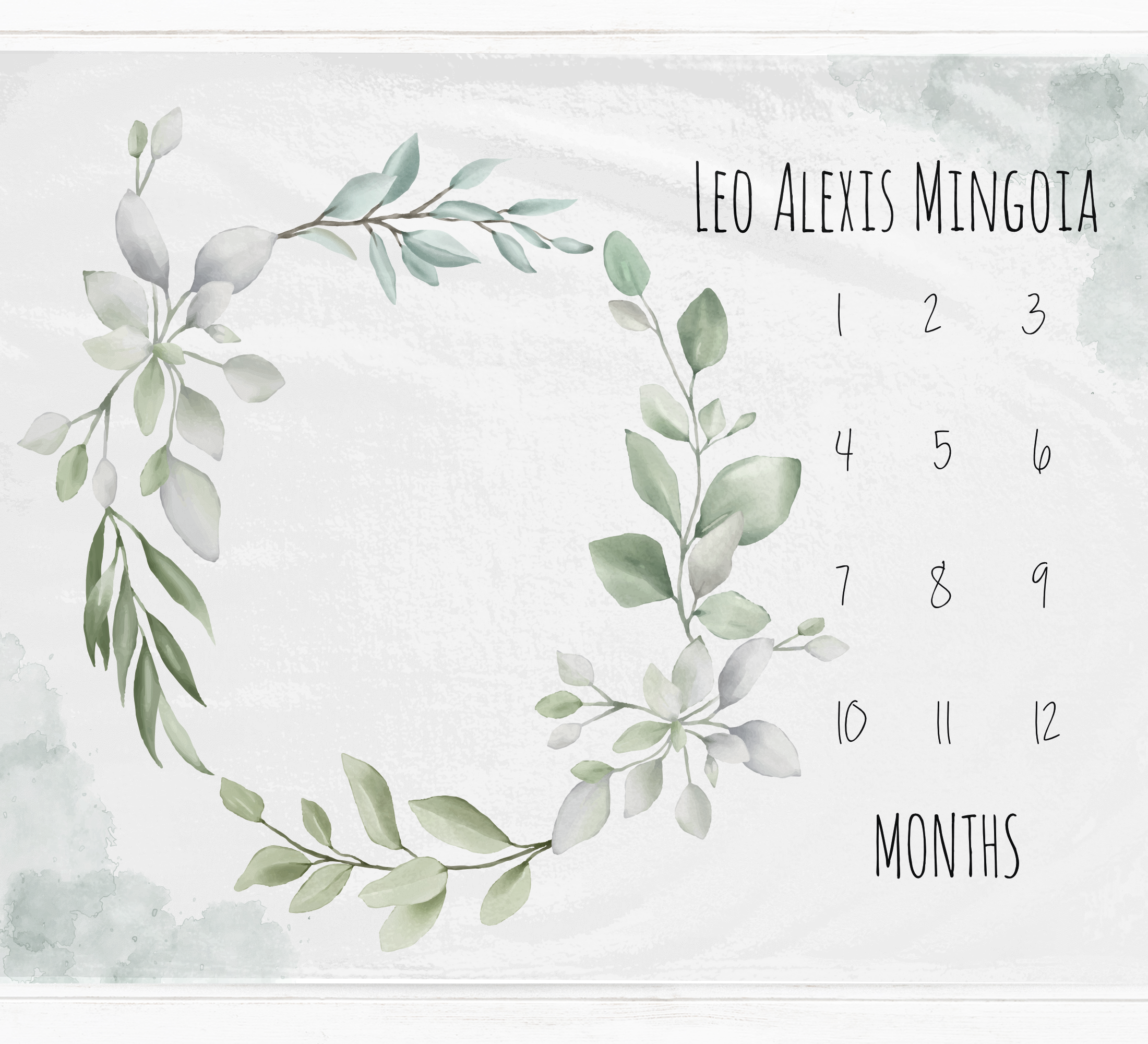 a calendar with a wreath of leaves on it