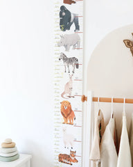 a child's growth chart with animals on it