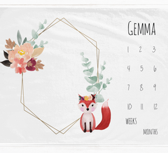 a calendar with a picture of a fox and flowers