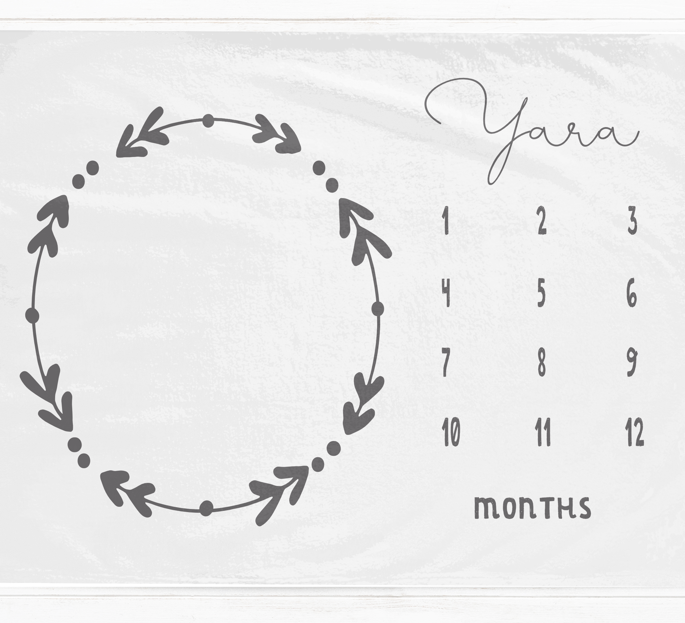 a calendar with a wreath on the front of it