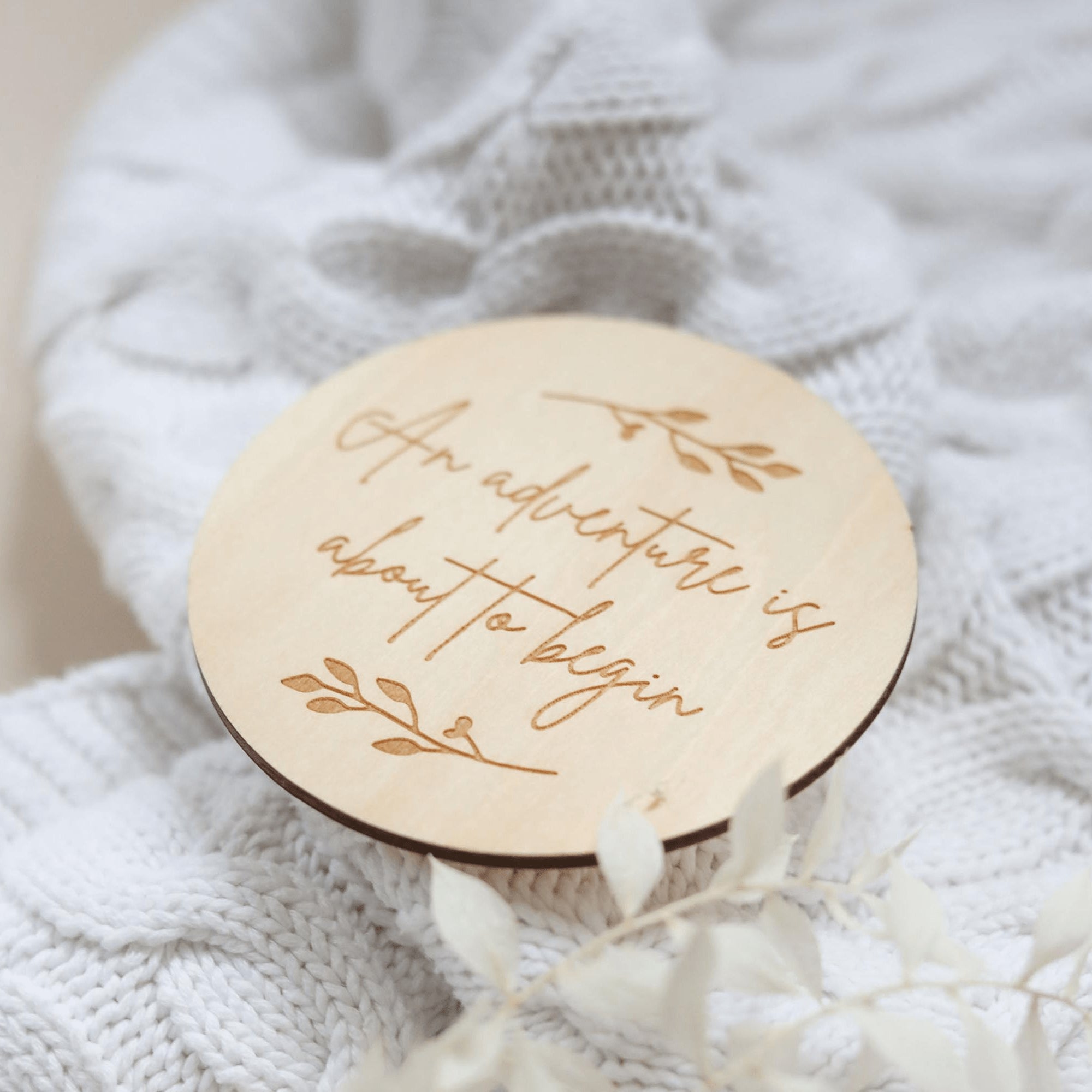 a wooden plaque with a message on it