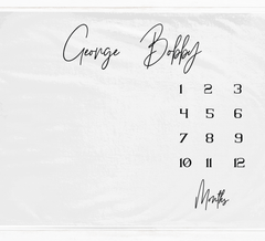 a white sheet with a black and white calendar on it