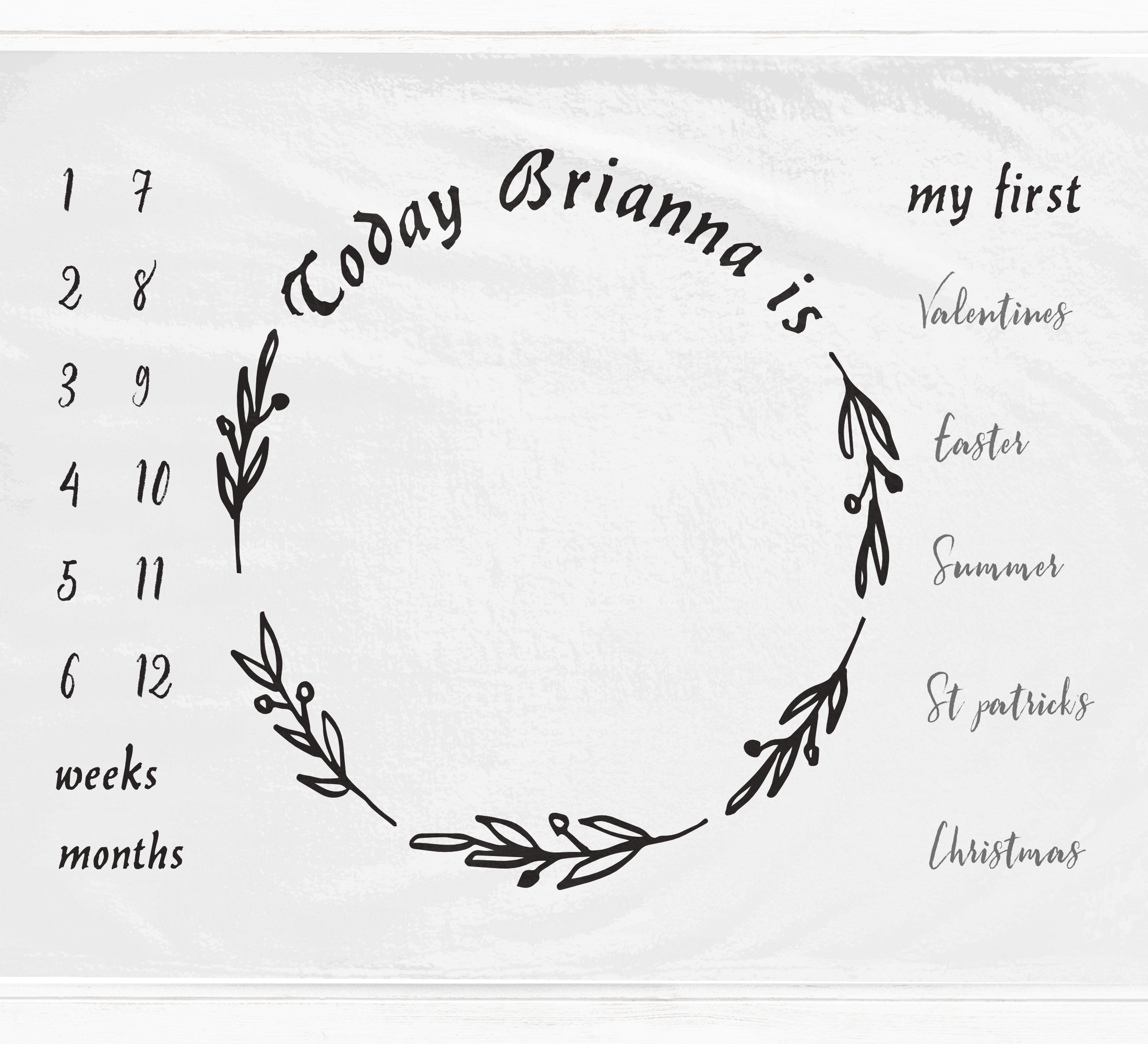 a white towel with a wreath drawn on it