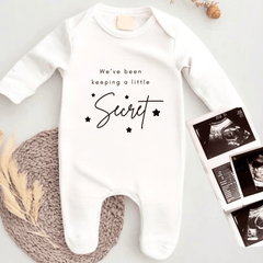 We've Been Keeping A Secret Pregnancy Reveal Baby Grow - Baby Pandas