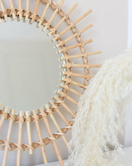 a mirror that is sitting on a table