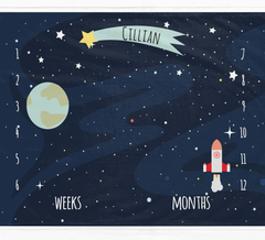 a space themed calendar with a rocket and stars